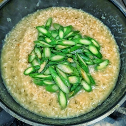 Risotto with slices of green asparagus