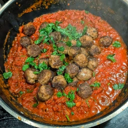Add meatballs and parsley
