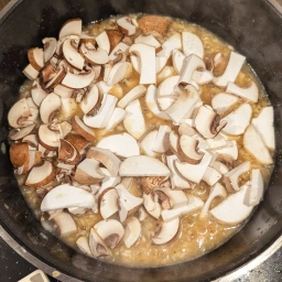 Stir the mushrooms into the rice