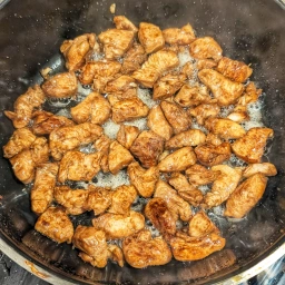 Stir-fried marinated chicken breast fillet pieces