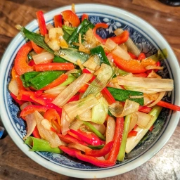 Stir-fried onion, garlic, ginger, bell pepper and spring onions
