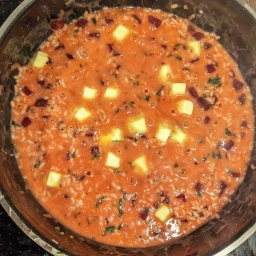 Melting the butter into the risotto