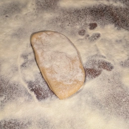 Pasta dough on a floured work surface